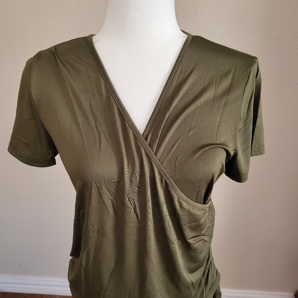 A V-line top is a stylish garment characterized by its V-shaped neckline. Size L